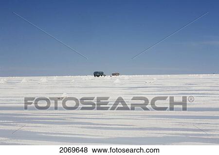 Truck Collecting Salt From Piles Of Salt At The Salar De Uyuni, The World's Largest Salt Flat, Potosi Department, Bolivia View Large Photo Image Stock Photo - Truck Collecting Salt From Piles Of Salt At The Salar De Uyuni, The World's Largest Salt Flat, Potosi Department, Bolivia. Fotosearch