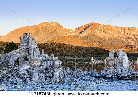 Tufa formations and mountains at sunrise, Mono Lake; Lee Vining, California, United States of America View Large Photo Image Stock Photograph - Tufa formations and mountains at sunrise, Mono Lake; Lee Vining, California, United States of America. Fotosearch