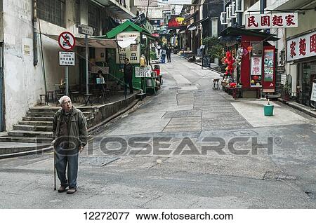 Typical street near Hollywood Road; Hong Kong Island, China View Large Photo Image Stock Photo - Typical street near Hollywood Road; Hong Kong Island, China. Fotosearch