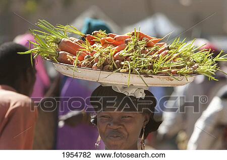 Vegetable vendor at the Monday Market, Djenne, Mali View Large Photo Image Stock Image - Vegetable vendor at the Monday Market, Djenne, Mali. Fotosearch