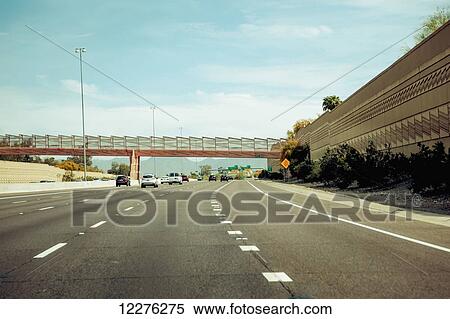Vehicles on a highway; Phoenix, Arizona, United States of America View Large Photo Image Stock Photography - Vehicles on a highway; Phoenix, Arizona, United States of America. Fotosearch