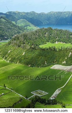 View of a green crater in Sete Cidades; Ponta Delgada, Sao Miguel, Azores, Portugal View Large Photo Image Stock Photograph - View of a green crater in Sete Cidades; Ponta Delgada, Sao Miguel, Azores, Portugal. Fotosearch