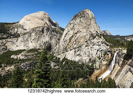 Stock Photograph - View of Half Dome, Liberty Cap and Nevada Fall, Yosemite National Park; California, United States of America. Fotosearch