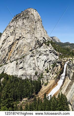 View of Liberty Cap and Nevada Fall, Yosemite National Park; California, United States of America View Large Photo Image Stock Photograph - View of Liberty Cap and Nevada Fall, Yosemite National Park; California, United States of America. Fotosearch