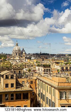 View of roofs and domes across a cityscape; Rome, Italy View Large Photo Image Stock Photograph - View of roofs and domes across a cityscape; Rome, Italy. Fotosearch