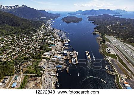 View overlooking cruise ships, Tongass Narrows and downtown Ketchikan, Revillagigedo Island, Southeast Alaska; Ketchikan, Alaska, United States of America View Large Photo Image Stock Photo - View overlooking cruise ships, Tongass Narrows and downtown Ketchikan, Revillagigedo Island, Southeast Alaska; Ketchikan, Alaska, United States of America. Fotosearch