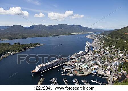 View overlooking cruise ships, Tongass Narrows and downtown Ketchikan, Revillagigedo Island, Southeast Alaska; Ketchikan, Alaska, United States of America View Large Photo Image Stock Photography - View overlooking cruise ships, Tongass Narrows and downtown Ketchikan, Revillagigedo Island, Southeast Alaska; Ketchikan, Alaska, United States of America. Fotosearch