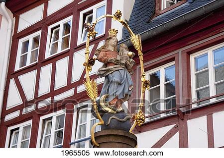 Stock Photography - Virgin And Child Statue On The Fountain In The Kirschgarten, Mainz, Germany. Fotosearch
