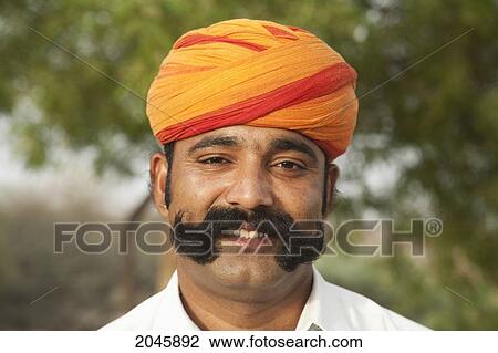 Waiter At The Desert Resort In Mandawa, Rajasthan, India View Large Photo Image Stock Image - Waiter At The Desert Resort In Mandawa, Rajasthan, India. Fotosearch