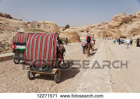 Walking and riding into the site; Petra, Jordan View Large Photo Image Stock Image - Walking and riding into the site; Petra, Jordan. Fotosearch