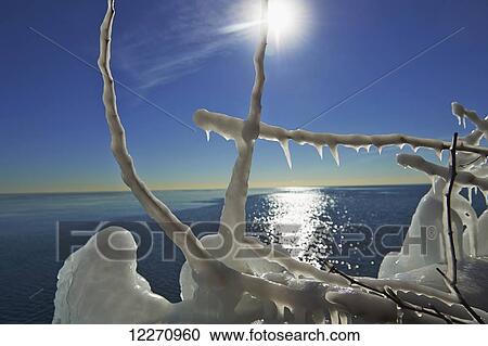 Stock Image - Ward's Island icy waterfront; Toronto, Ontario, Canada. Fotosearch