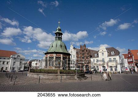 Stock Photography - Wasserkunst Well On The Marktplatz (Marketplace), Wismar, Germany. Fotosearch