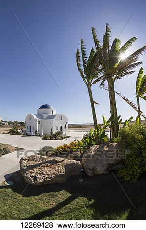 Stock Photo - White church building along the mediterranean coast; Geroskipou, Cyprus. Fotosearch
