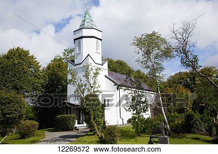 Stock Image - White church building with steeple; Sneem, County Kerry, Ireland. Fotosearch