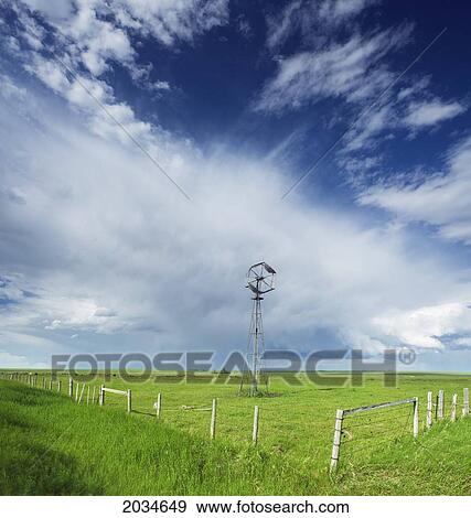 Windmill And Pasture And Fence Near Carstairs, Alberta View Large Photo Image Stock Photo - Windmill And Pasture And Fence Near Carstairs, Alberta. Fotosearch