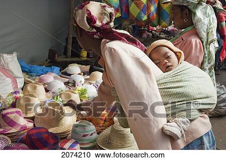 Woman And Baby At The Weekly Market In Fianarantsoa, Madagascar View Large Photo Image Stock Image - Woman And Baby At The Weekly Market In Fianarantsoa, Madagascar. Fotosearch