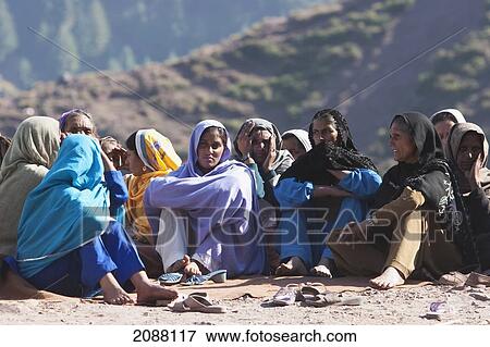 Stock Photo - Women In A Burial Procession After The 8 October 2005 Earthquake, Chikar, Azad Kashmir, Pakistan. Fotosearch