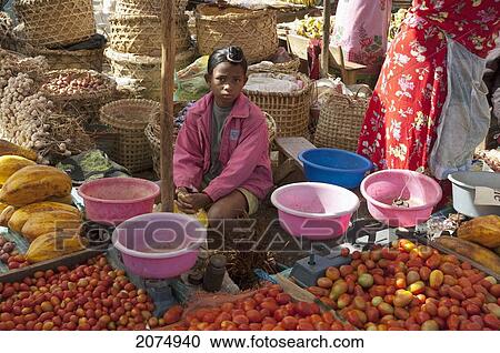 Stock Image - Women Selling Vegetables At The Weekly Market In Fianarantsoa, Madagascar. Fotosearch