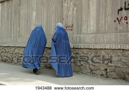 Stock Photo - Women Wearing Burqas On A Kabul Street,, Afghanistan. Fotosearch