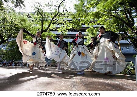 Women Wearing Traditional Dress Performing A Paraguayan Polka, Asuncion, Paraguay View Large Photo Image Stock Photo - Women Wearing Traditional Dress Performing A Paraguayan Polka, Asuncion, Paraguay. Fotosearch