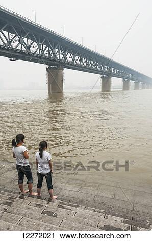 Wuhan Bridge along Yangtze river; Hubei Province, China View Large Photo Image Stock Image - Wuhan Bridge along Yangtze river; Hubei Province, China. Fotosearch