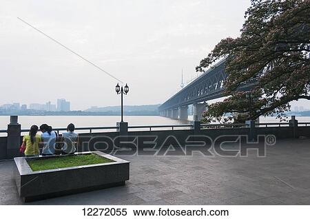 Stock Photography - Wuhan Bridge crossing Yangtze river at sunset; Wuhan, Hubei province, China. Fotosearch