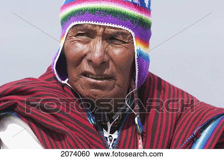 Yatiri (Aymara Healer) Performing An Ancient Sacrificial Burning Rite To Bring The Good Will Of The Goddess Pachamama (Mother Earth), Isla Del Sol In Titicaca Lake, La Paz Department, Bolivia View Large Photo Image Stock Image - Yatiri (Aymara Healer) Performing An Ancient Sacrificial Burning Rite To Bring The Good Will Of The Goddess Pachamama (Mother Earth), Isla Del Sol In Titicaca Lake, La Paz Department, Bolivia. Fotosearch