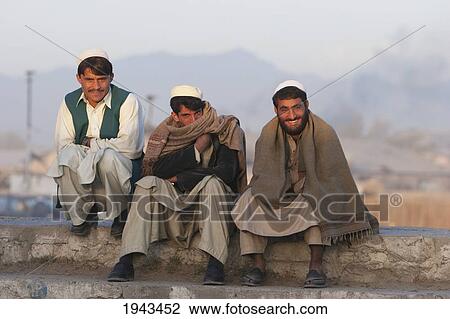 Young Afghan Men Sitting By The Side On A Road In Kabul,, Afghanistan View Large Photo Image Stock Image - Young Afghan Men Sitting By The Side On A Road In Kabul,, Afghanistan. Fotosearch