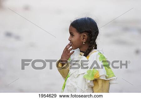 Young girl, Timbuktu, Mali View Large Photo Image Stock Photo - Young girl, Timbuktu, Mali. Fotosearch