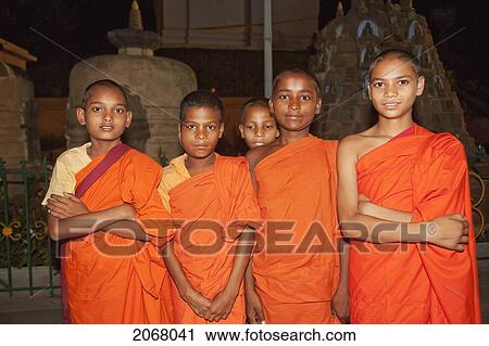 Stock Image - Young Novices, Mahabodi Temple, Bodhgaya, Bihar, India. Fotosearch