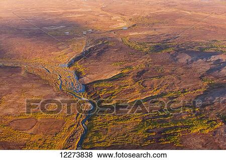 Aerial view of a river and the Kigluaik Mountains, North of Nome, Seward Peninsula; Alaska, United States of America View Large Photo Image Stock Photo - Aerial view of a river and the Kigluaik Mountains, North of Nome, Seward Peninsula; Alaska, United States of America. Fotosearch
