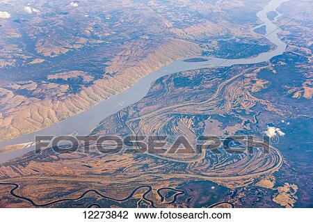 Aerial view of the Yukon River and surrounding tundra; Alaska, United States of America View Large Photo Image Stock Image - Aerial view of the Yukon River and surrounding tundra; Alaska, United States of America. Fotosearch
