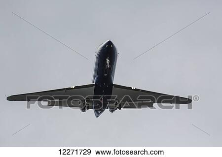 Stock Photo - Airplane flying overhead; Puerto Rico. Fotosearch
