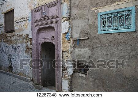 Atmospheric old doorway in Jewish quarter; Fes, Morocco View Large Photo Image Stock Photo - Atmospheric old doorway in Jewish quarter; Fes, Morocco. Fotosearch