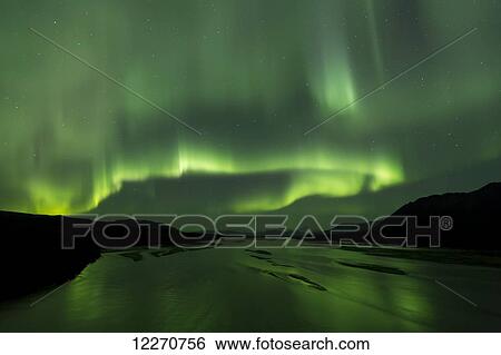 Aurora Borealis (Northern Lights) reflecting of the Susitna River bridge along the Denali Highway, Southcentral Alaska; Alaska, United States of America View Large Photo Image Stock Photograph - Aurora Borealis (Northern Lights) reflecting of the Susitna River bridge along the Denali Highway, Southcentral Alaska; Alaska, United States of America. Fotosearch
