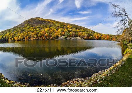 Autumn foliage at Hessian Lake, Bear Mountain State Park; Bear Mountain, New York, United States of America View Large Photo Image Stock Image - Autumn foliage at Hessian Lake, Bear Mountain State Park; Bear Mountain, New York, United States of America. Fotosearch