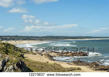 Stock Photo - Beach along the coastline; La Pedrera, Uruguay. Fotosearch