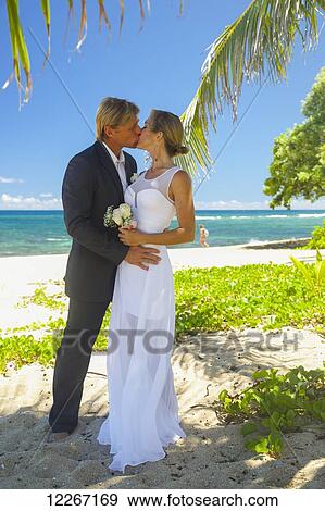 Beach wedding; Kauai, Hawaii, United States of America View Large Photo Image Stock Photo - Beach wedding; Kauai, Hawaii, United States of America. Fotosearch