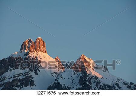 Stock Photograph - Bishop's Hat mountain peaks at dawn; Filzmoos, Austria. Fotosearch