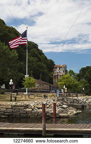 Boat dock with the American Flag flying; McGregor, Iowa, United States of America View Large Photo Image Stock Image - Boat dock with the American Flag flying; McGregor, Iowa, United States of America. Fotosearch