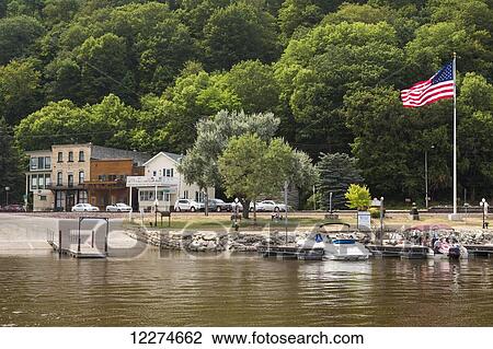 Boats docked with the American Flag flying; McGregor, Iowa, United States of America View Large Photo Image Stock Image - Boats docked with the American Flag flying; McGregor, Iowa, United States of America. Fotosearch