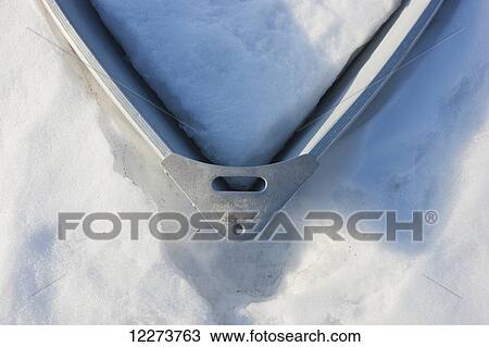 Bow of boat filled with and surrounded by snow; Nome, Alaska, United States of America View Large Photo Image Stock Image - Bow of boat filled with and surrounded by snow; Nome, Alaska, United States of America. Fotosearch