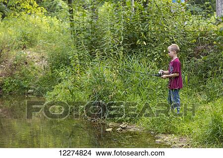 Boy fishing in Bear Creek at Bixby State Preserve, near Edgewood; Iowa, United States of America View Large Photo Image Picture - Boy fishing in Bear Creek at Bixby State Preserve, near Edgewood; Iowa, United States of America. Fotosearch
