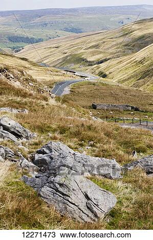 Stock Image - Buttertubs Pass from Hawes, heading into Swaledale; North Yorkshire, England. Fotosearch