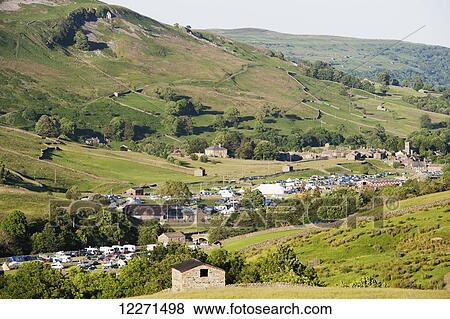 Campsites in Swaledale, near Muker, after the 2014 Tour De France, which passed through the Yorkshire Dales; North Yorkshire, England View Large Photo Image Stock Photo - Campsites in Swaledale, near Muker, after the 2014 Tour De France, which passed through the Yorkshire Dales; North Yorkshire, England. Fotosearch