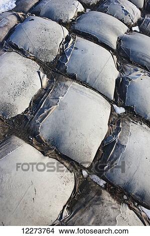 Cement filled sandbags for erosion control along the coast of Nome; Nome, Alaska, United States of America View Large Photo Image Picture - Cement filled sandbags for erosion control along the coast of Nome; Nome, Alaska, United States of America. Fotosearch