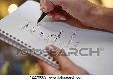 Checklist of names for Christmas shopping list; Ontario, Canada View Large Photo Image Stock Image - Checklist of names for Christmas shopping list; Ontario, Canada. Fotosearch
