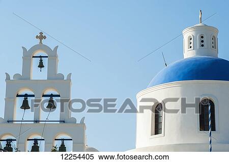 Stock Photography - Church domed roof and bells; Oia, Santorini, Greece. Fotosearch