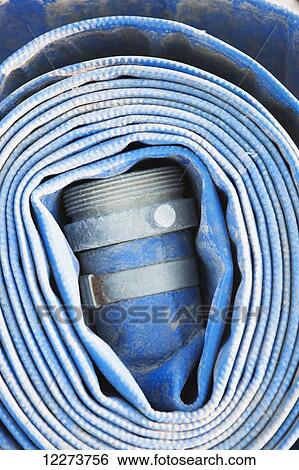 Coiled fire hose; Noatak, Alaska, United States of America View Large Photo Image Stock Photograph - Coiled fire hose; Noatak, Alaska, United States of America. Fotosearch