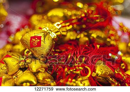 Decoration for hanging with wishes to bring good luck used in Chinese New Year, the Chinese character is used for representing blessing or good fortune; Xiamen, Fujian, China View Large Photo Image Stock Photo - Decoration for hanging with wishes to bring good luck used in Chinese New Year, the Chinese character is used for representing blessing or good fortune; Xiamen, Fujian, China. Fotosearch